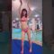 Hot Asian Girl wearing Bikini dancing near the swimming pool ( bouncing busty )